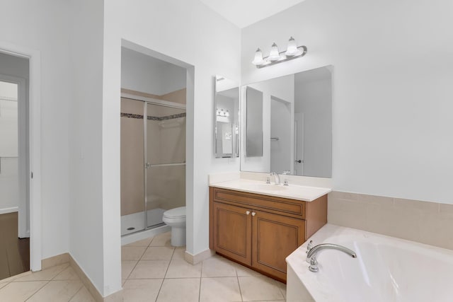 full bathroom featuring a shower stall, vanity, tile patterned floors, and a garden tub