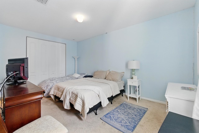 4635 Mediterranean Cir, Palm Beach Gardens, FL 33418 - bedroom featuring a closet and carpet flooring