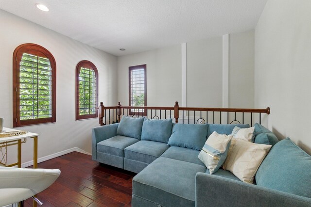 4635 Mediterranean Cir, Palm Beach Gardens, FL 33418 - living area with dark wood-style flooring, baseboards, and recessed lighting