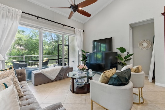 4635 Mediterranean Cir, Palm Beach Gardens, FL 33418 - living room with crown molding, tile patterned floors, ceiling fan, high vaulted ceiling, and baseboards