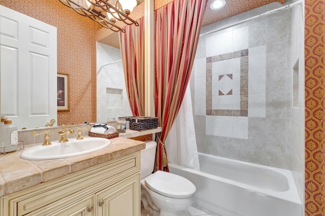 bathroom with wallpapered walls, toilet, shower / bathtub combination with curtain, vanity, and recessed lighting