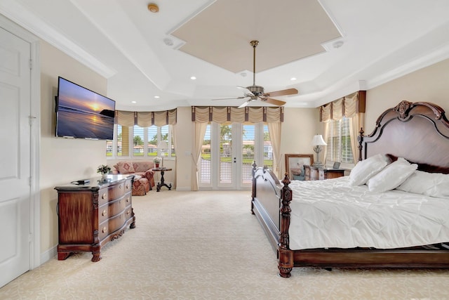 bedroom with access to outside, a raised ceiling, crown molding, light carpet, and baseboards