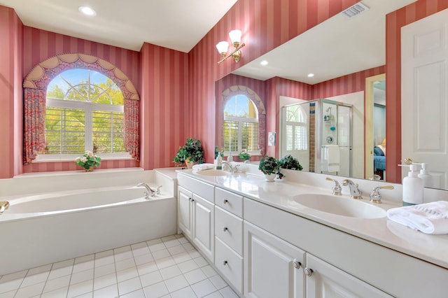 full bathroom with wallpapered walls, plenty of natural light, a shower stall, a bath, and double vanity