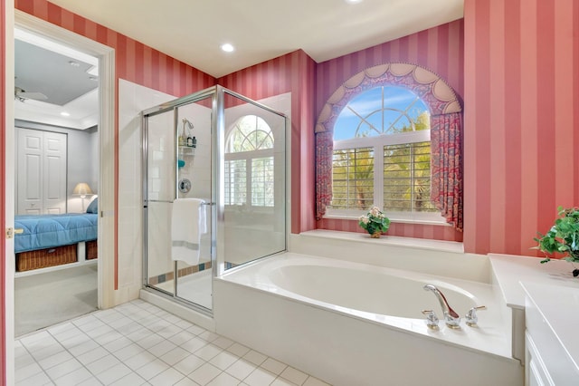 ensuite bathroom with wallpapered walls, a shower stall, recessed lighting, a garden tub, and tile patterned floors