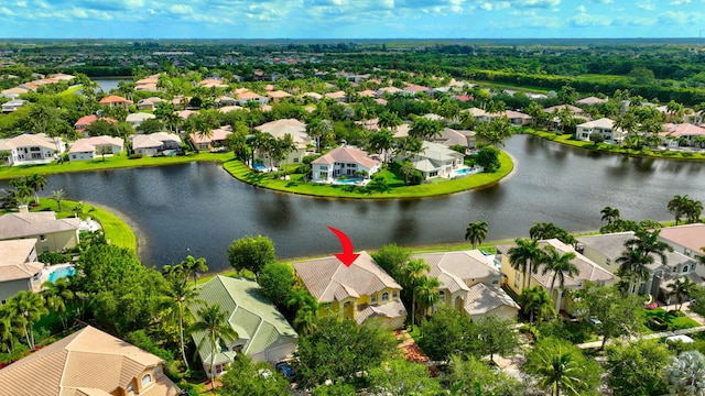 aerial perspective of suburban area with a large body of water