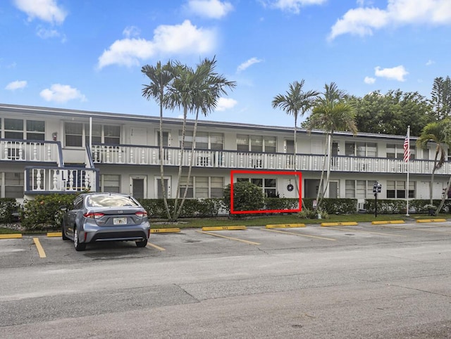 226 Northampton L Unit 226, West Palm Beach, FL 33417 - view of building exterior featuring uncovered parking