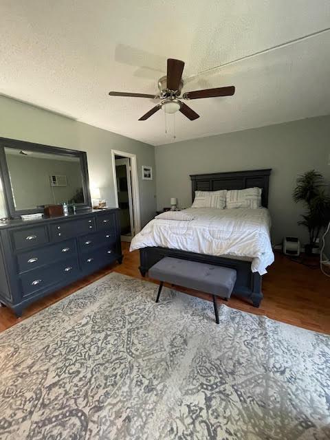 196 Upminster L Unit 196, Deerfield Beach, FL 33442 - bedroom with dark wood finished floors and ceiling fan
