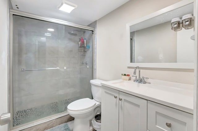 1124 NW 13th St Unit 208, Boca Raton, FL 33486 - bathroom with toilet, a stall shower, and vanity