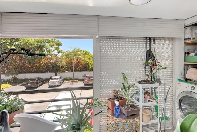 1124 NW 13th St Unit 208, Boca Raton, FL 33486 - sunroom with washer / dryer