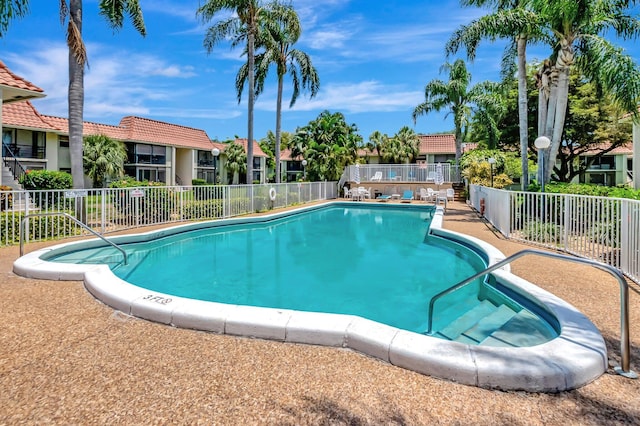 1124 NW 13th St Unit 208, Boca Raton, FL 33486 - community pool featuring fence and a residential view