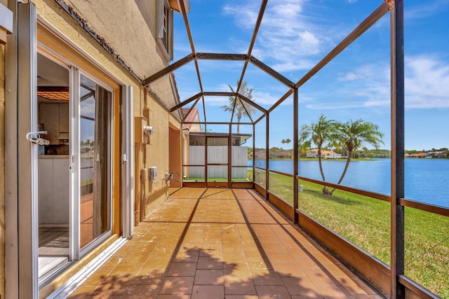 1388 Garden Rd, Weston, FL 33326 - unfurnished sunroom featuring a water view