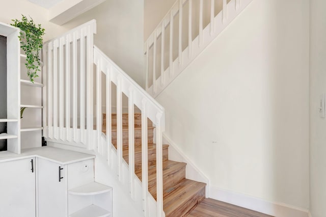 1388 Garden Rd, Weston, FL 33326 - stairs featuring wood finished floors