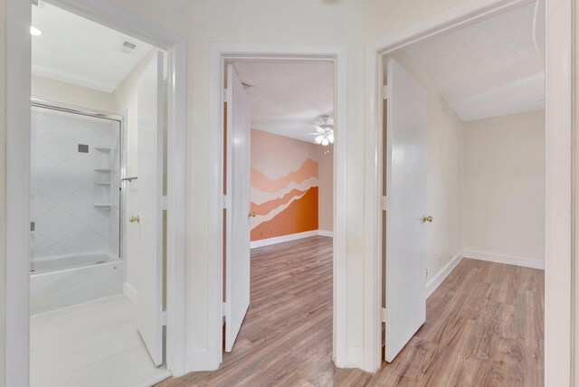 1388 Garden Rd, Weston, FL 33326 - corridor with wood finished floors and baseboards