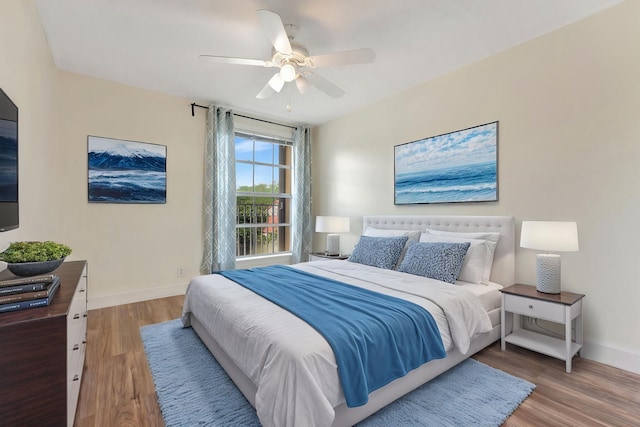 1388 Garden Rd, Weston, FL 33326 - bedroom with light wood-style floors and ceiling fan