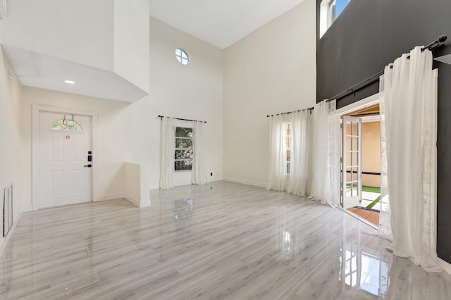 1388 Garden Rd, Weston, FL 33326 - entryway featuring a towering ceiling and wood finished floors