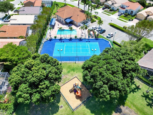 aerial view of residential area with a pool area