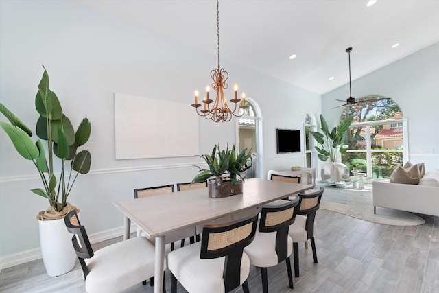 dining space with plenty of natural light, light wood-style floors, ceiling fan, recessed lighting, and a chandelier
