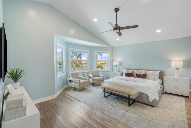 bedroom featuring wood finished floors, recessed lighting, baseboards, high vaulted ceiling, and a ceiling fan