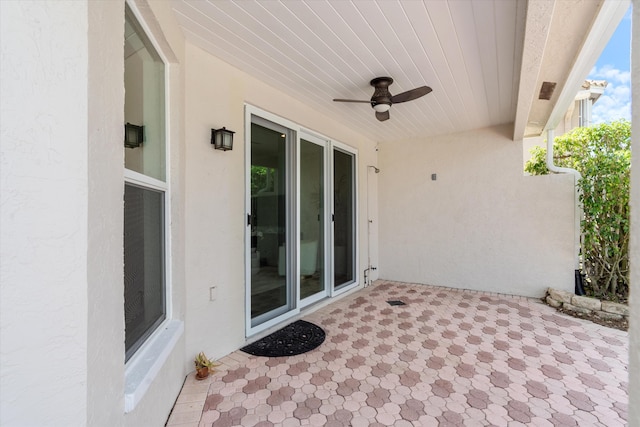 view of patio / terrace featuring ceiling fan