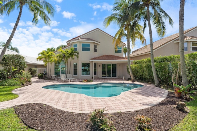 view of swimming pool with a patio area