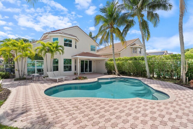 view of swimming pool featuring a patio