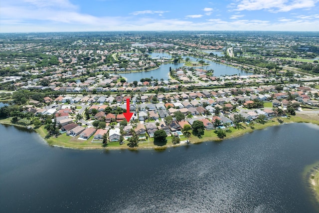 view of property location with nearby suburban area and a nearby body of water