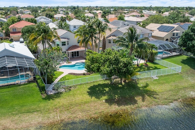 aerial view of residential area featuring a pool area