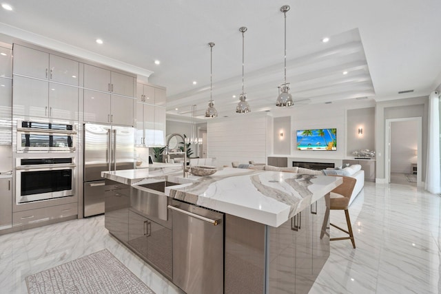 kitchen with modern cabinets, gray cabinets, appliances with stainless steel finishes, light marble finish flooring, and recessed lighting