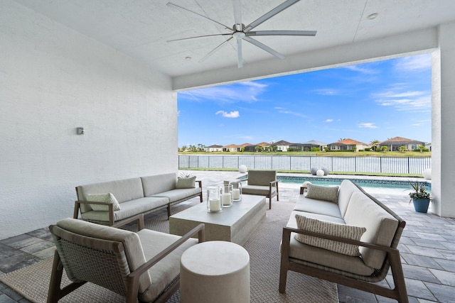 view of patio with an outdoor hangout area, ceiling fan, and a residential view