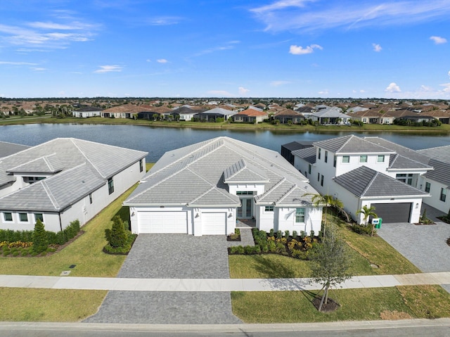 aerial perspective of suburban area featuring a large body of water