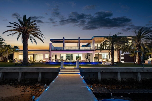 4460 NE 31st Ave, Lighthouse Point, FL 33064 - back of property featuring an outdoor pool and a patio area