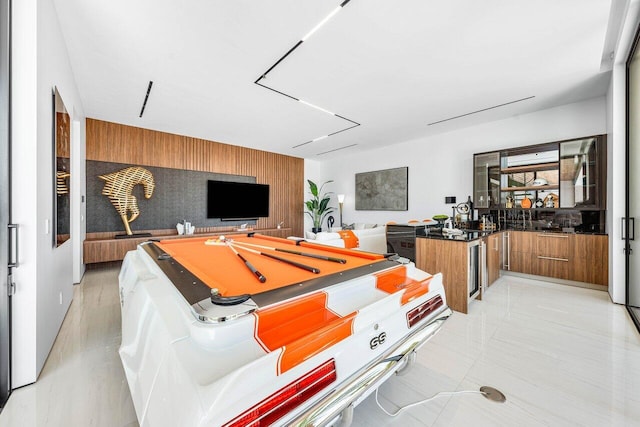 4460 NE 31st Ave, Lighthouse Point, FL 33064 - living room with an accent wall and pool table