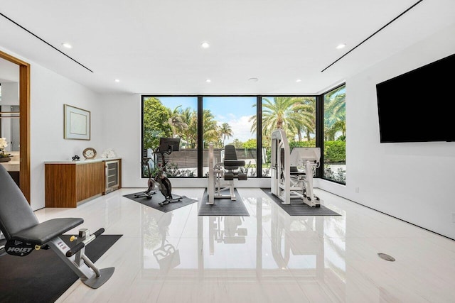 4460 NE 31st Ave, Lighthouse Point, FL 33064 - living room featuring a wall of windows, recessed lighting, and beverage cooler