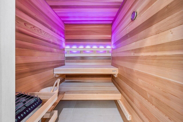 4460 NE 31st Ave, Lighthouse Point, FL 33064 - relaxing sauna / steam room with tile patterned floors and wood walls