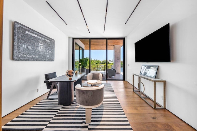 4460 NE 31st Ave, Lighthouse Point, FL 33064 - dining room featuring floor to ceiling windows and wood finished floors