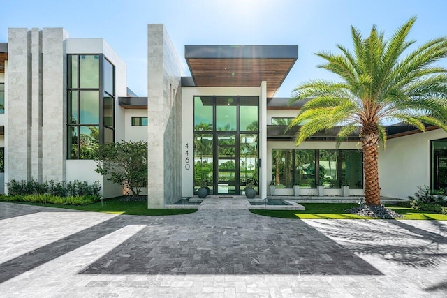 4460 NE 31st Ave, Lighthouse Point, FL 33064 - property entrance featuring french doors