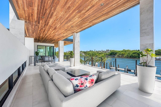 4460 NE 31st Ave, Lighthouse Point, FL 33064 - view of patio with a water view and a balcony