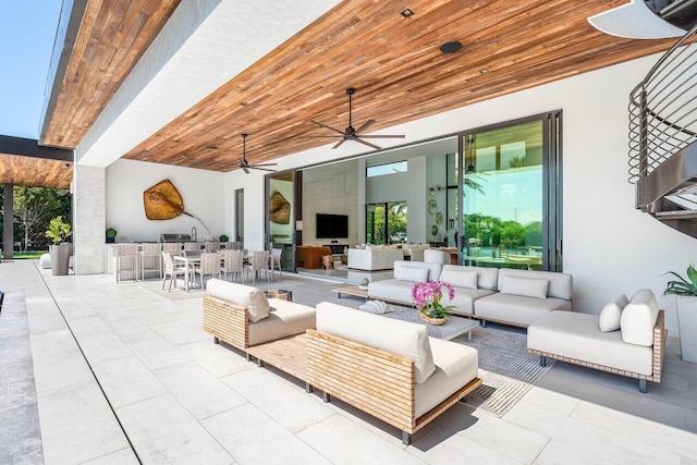 4460 NE 31st Ave, Lighthouse Point, FL 33064 - view of patio / terrace featuring an outdoor living space, a ceiling fan, a bar, and exterior kitchen