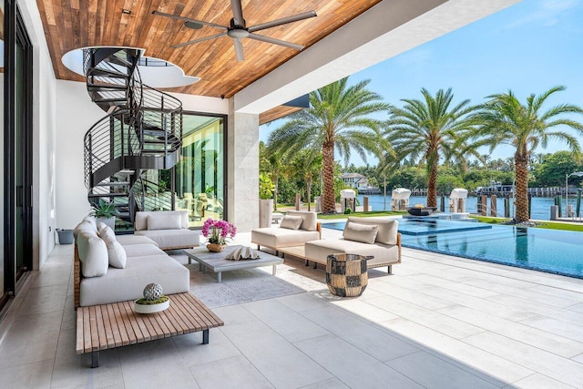 4460 NE 31st Ave, Lighthouse Point, FL 33064 - view of patio featuring a ceiling fan, outdoor lounge area, a pool with connected hot tub, and a water view