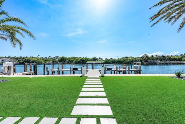 4460 NE 31st Ave, Lighthouse Point, FL 33064 - dock featuring a yard and a water view