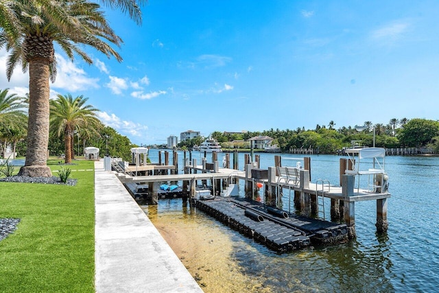4460 NE 31st Ave, Lighthouse Point, FL 33064 - dock area with a water view and a lawn
