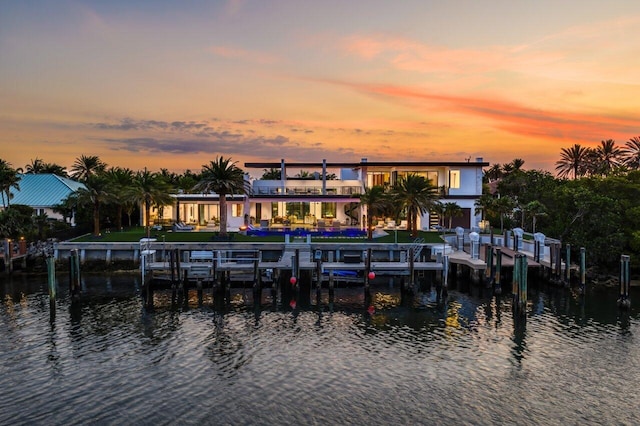 4460 NE 31st Ave, Lighthouse Point, FL 33064 - dock featuring a water view, boat lift, and a patio