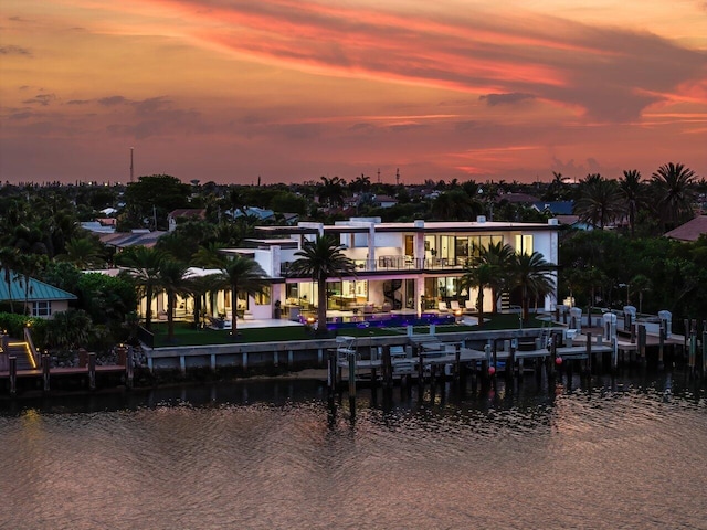 4460 NE 31st Ave, Lighthouse Point, FL 33064 - back of property with a water view, a patio, and a balcony
