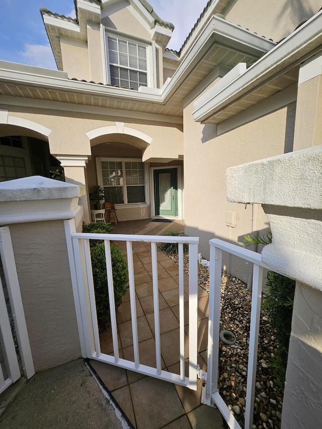 1639 SW Harbour Isles Cir Unit 29, Port Saint Lucie, FL 34986 - property entrance with stucco siding