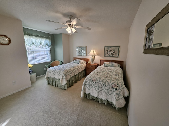1639 SW Harbour Isles Cir Unit 29, Port Saint Lucie, FL 34986 - bedroom featuring carpet, baseboards, a ceiling fan, and a textured ceiling