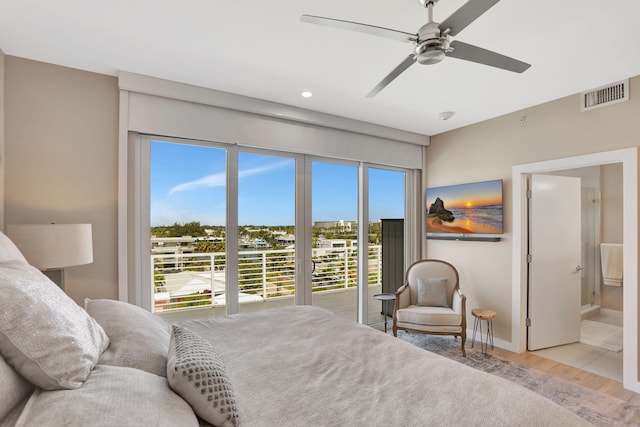 bedroom with wood finished floors, multiple windows, recessed lighting, baseboards, and a ceiling fan