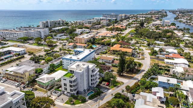 view of urban area featuring a nearby body of water