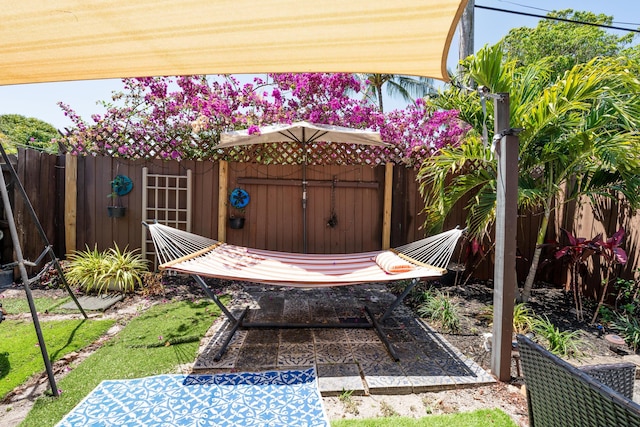 view of patio featuring fence