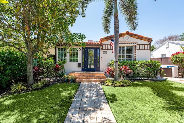 mediterranean / spanish-style house with stucco siding