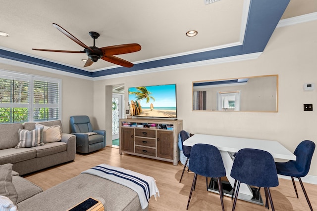 living room with crown molding, ceiling fan, wood finished floors, and recessed lighting